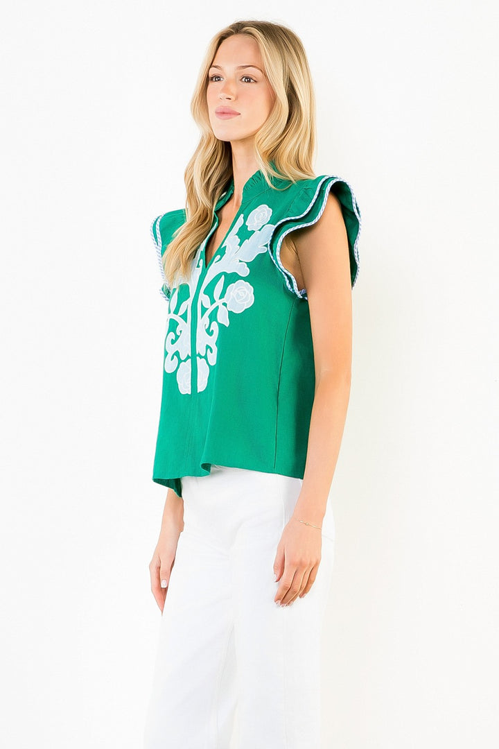 EMBROIDERED TOP WITH RUFFLED STRIPE SLEEVES