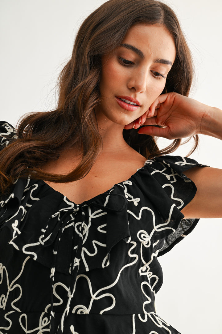 FLORAL EMBROIDERED RUFFLE BLOUSE