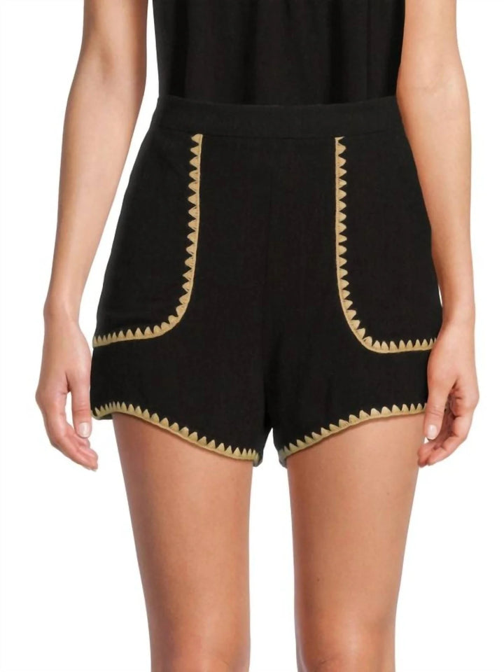 HIGH WAISTED SHORTS WITH TAN WHIP STITCH