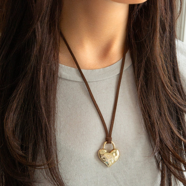 GOLD/BROWN ADJUSTABLE SUEDE NECKLACE WITH TEXTURED PUFFY HEART CHARM