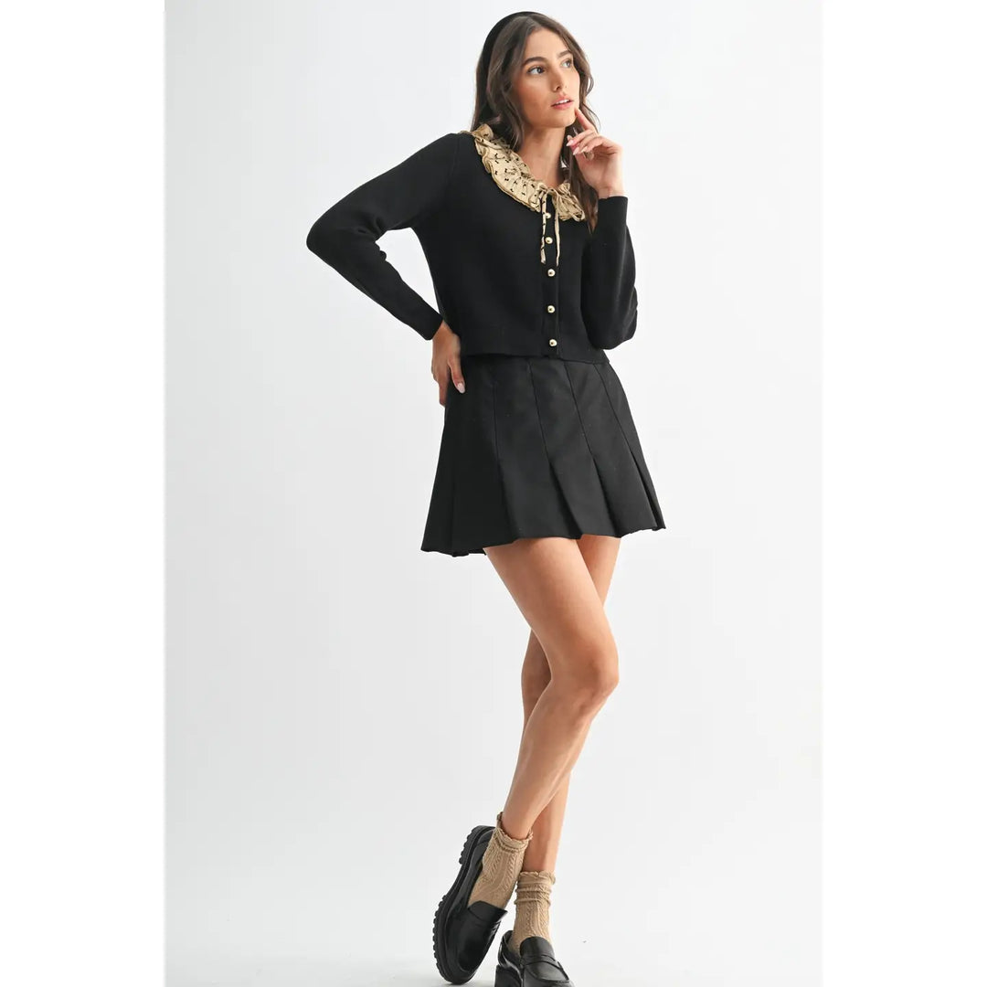 BUTTON-DOWN CARDIGAN WITH RUFFLED COLLAR