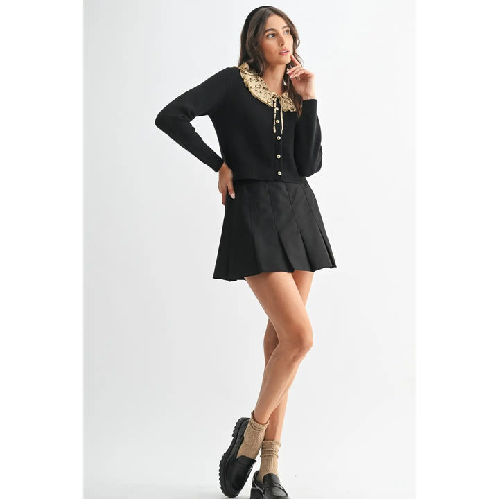BUTTON-DOWN CARDIGAN WITH RUFFLED COLLAR