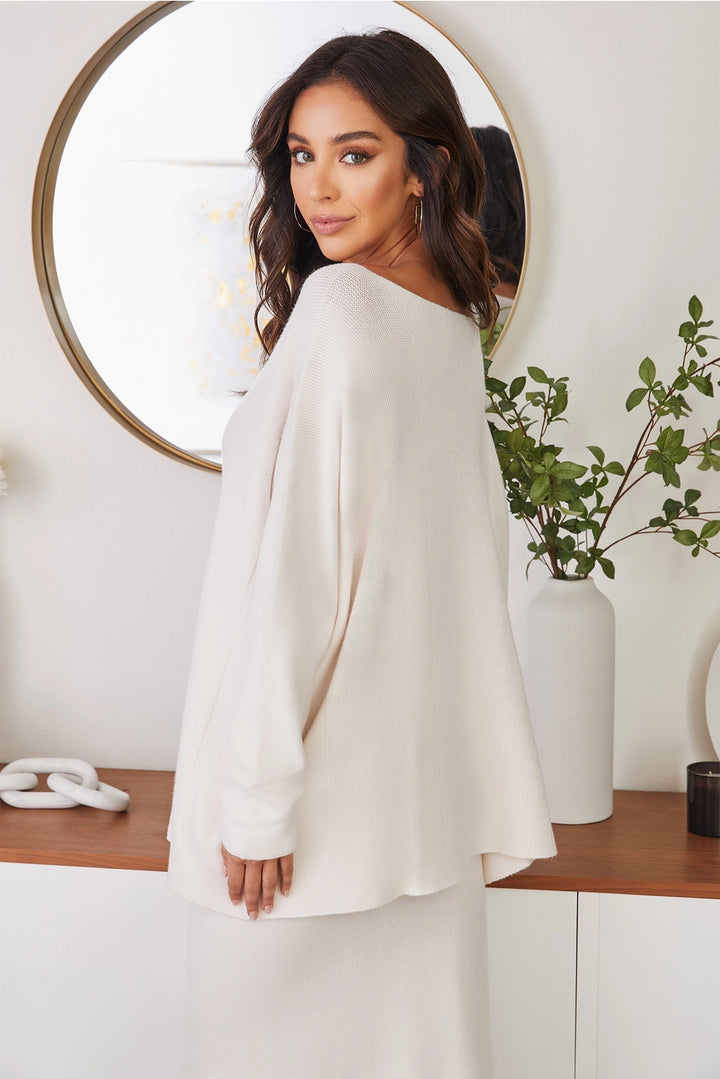 ASYMMETRICAL SWEATER