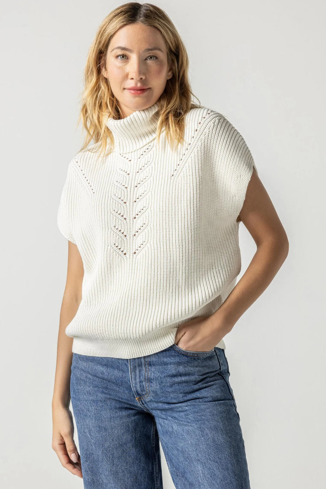 RIBBED PONCHO SWEATER