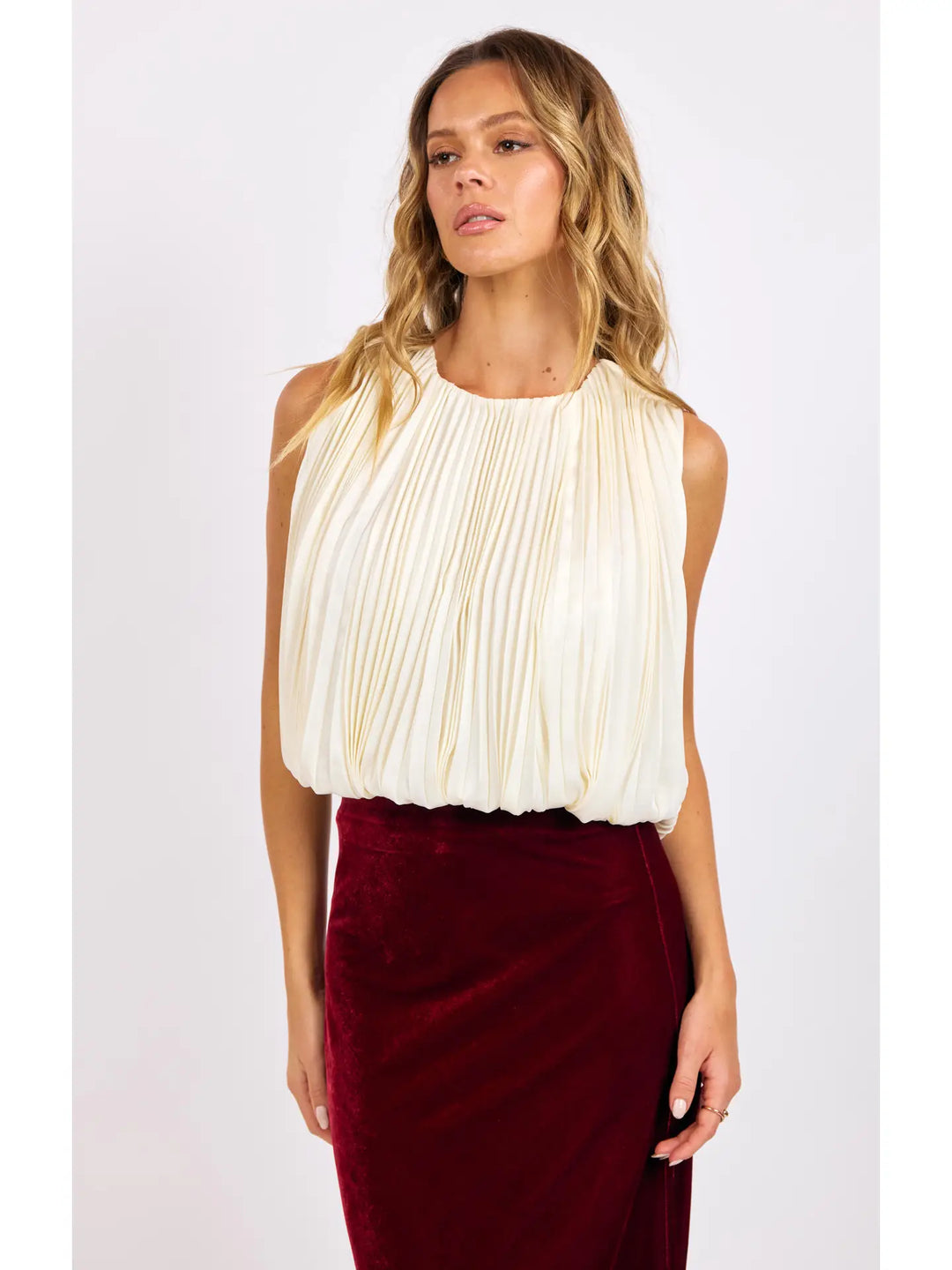 AMOUR PLEATED BUBBLE HEM TOP