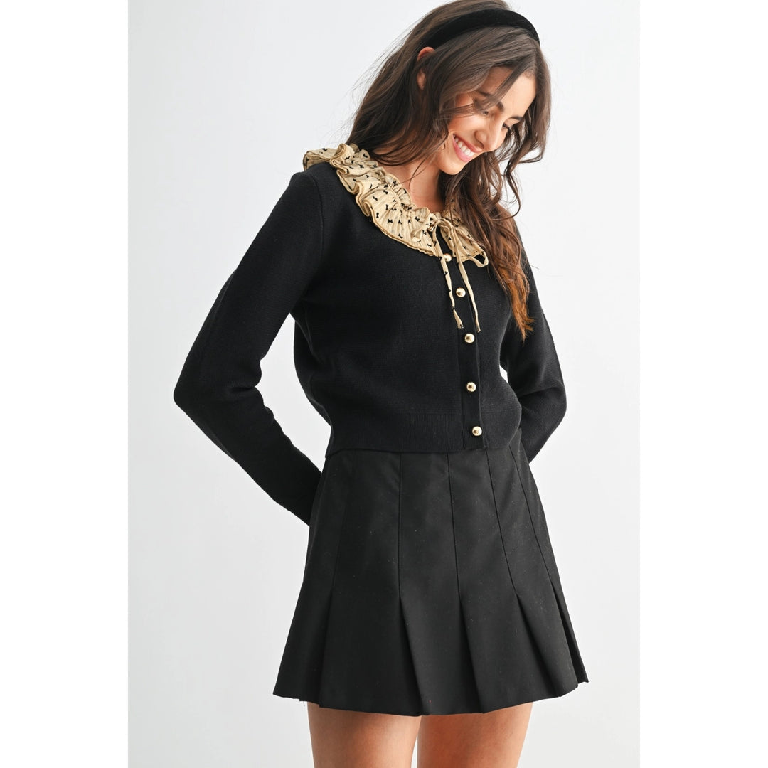 BUTTON-DOWN CARDIGAN WITH RUFFLED COLLAR