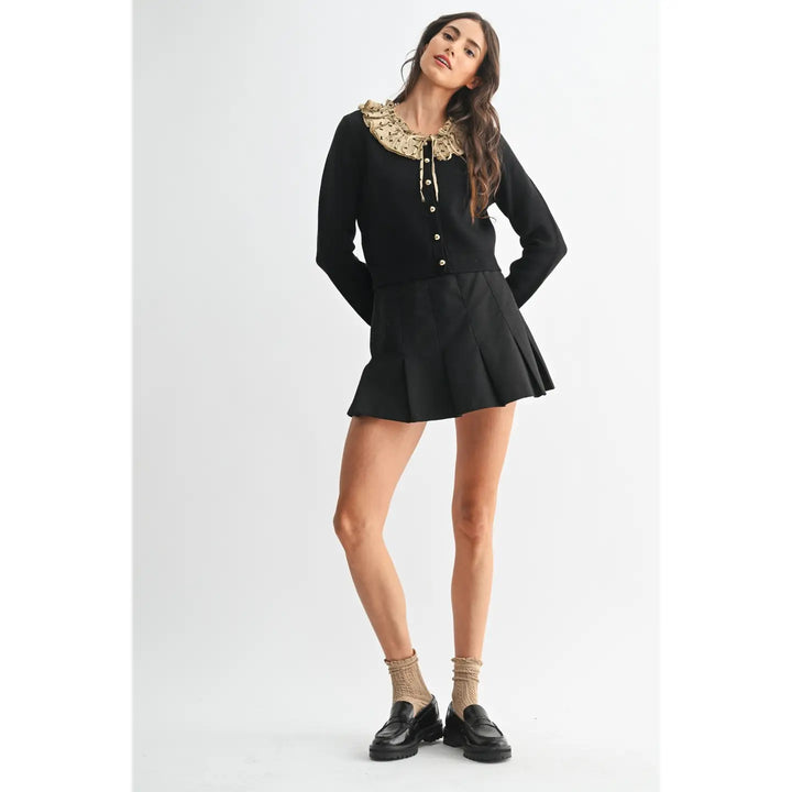 BUTTON-DOWN CARDIGAN WITH RUFFLED COLLAR