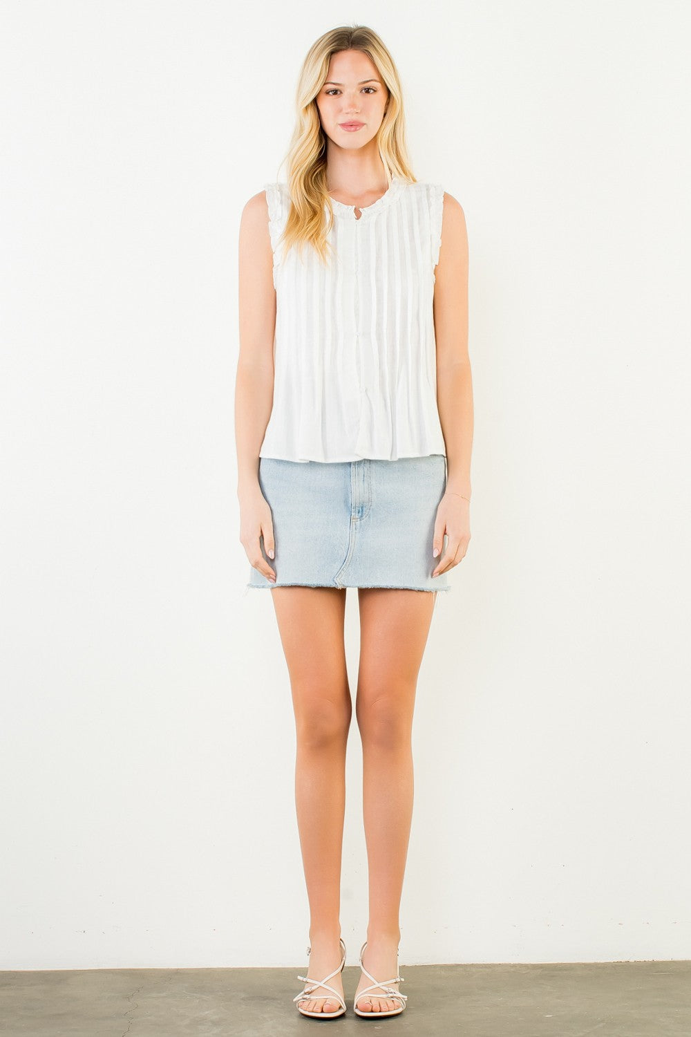 SLEEVELESS RUFFLE DETAIL TOP