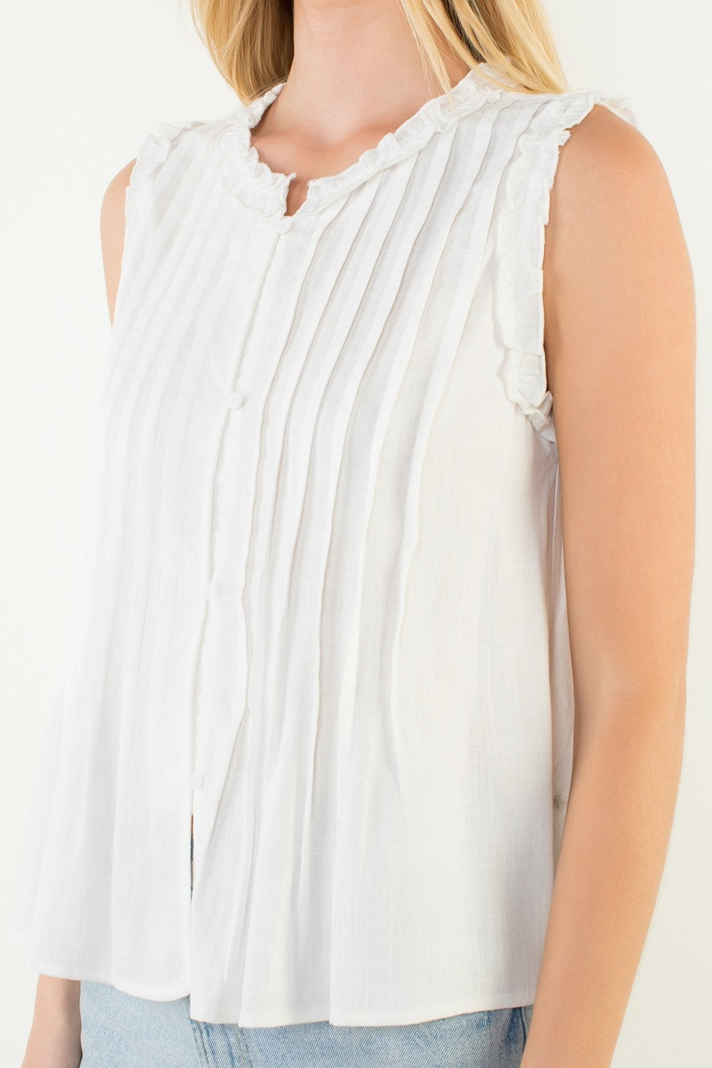 SLEEVELESS RUFFLE DETAIL TOP