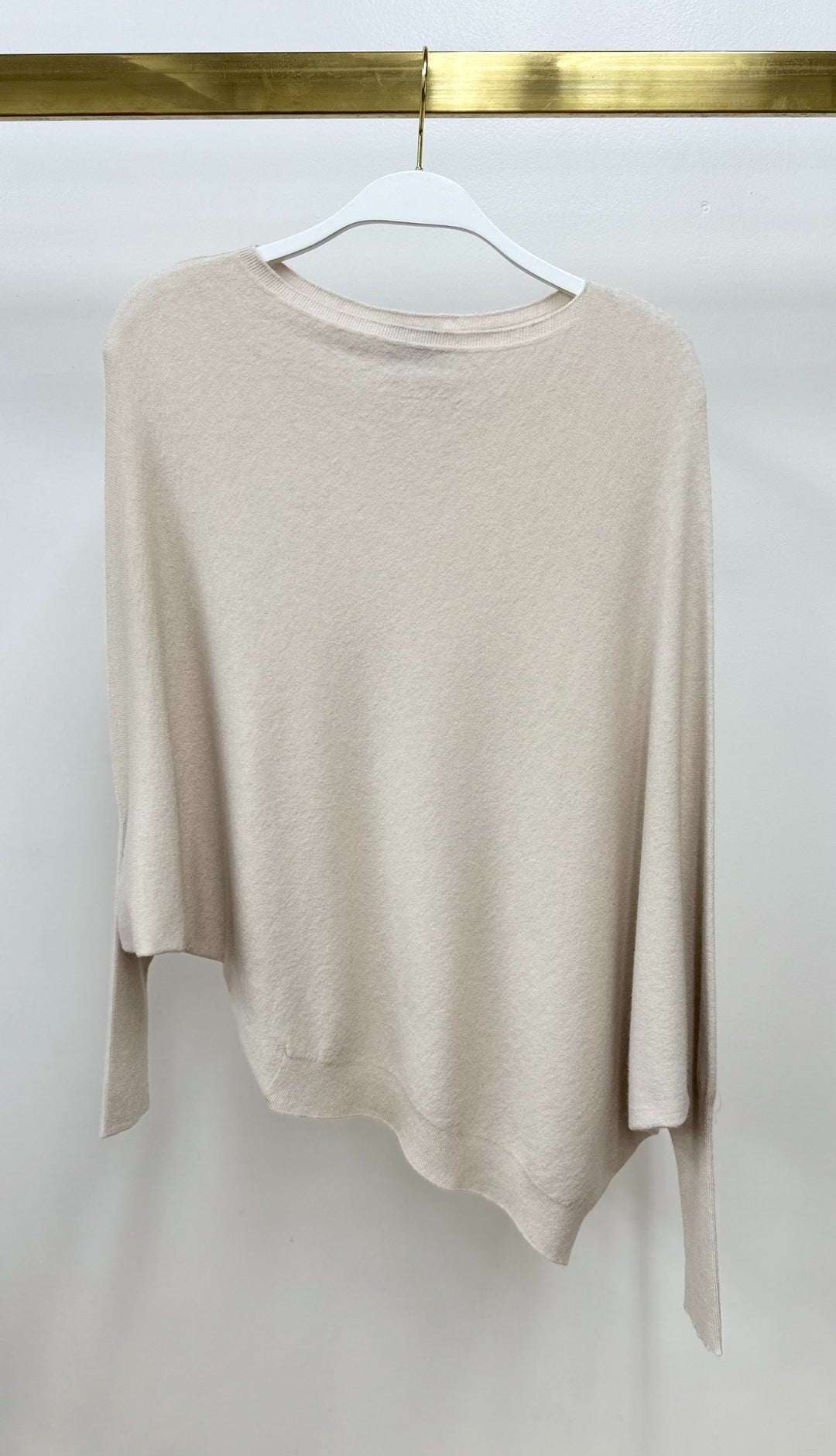 ASYMMETRICAL CUFF SLEEVE KNIT TOP